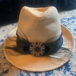 Straw fedora style hat with navy embellishments